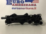 Variklio alyvos aušintuvas su filtru